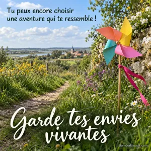 Un moulin à vent de papier multicolore se dresse au bord d’un chemin lumineux. Le message est : « Garde tes envies vivantes Tu peux encore choisir une aventure qui te ressemble ! ».